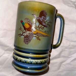 Vintage porcelain mug/music box